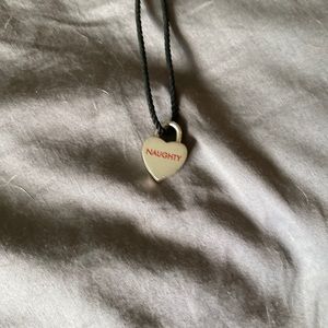 Tiffany naughty/nice sterling on black cord